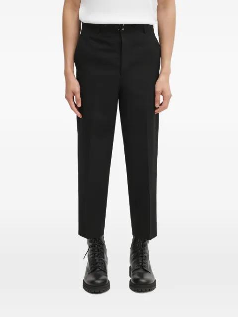 buttoned tab trousers by VISVIM