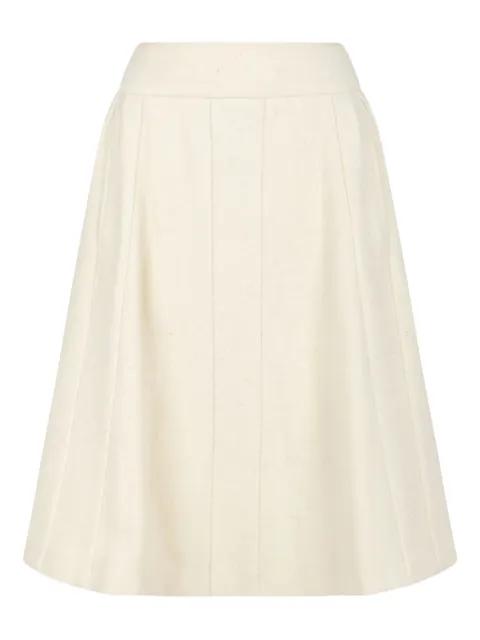 button pleated skirt by VIVIENNE WESTWOOD