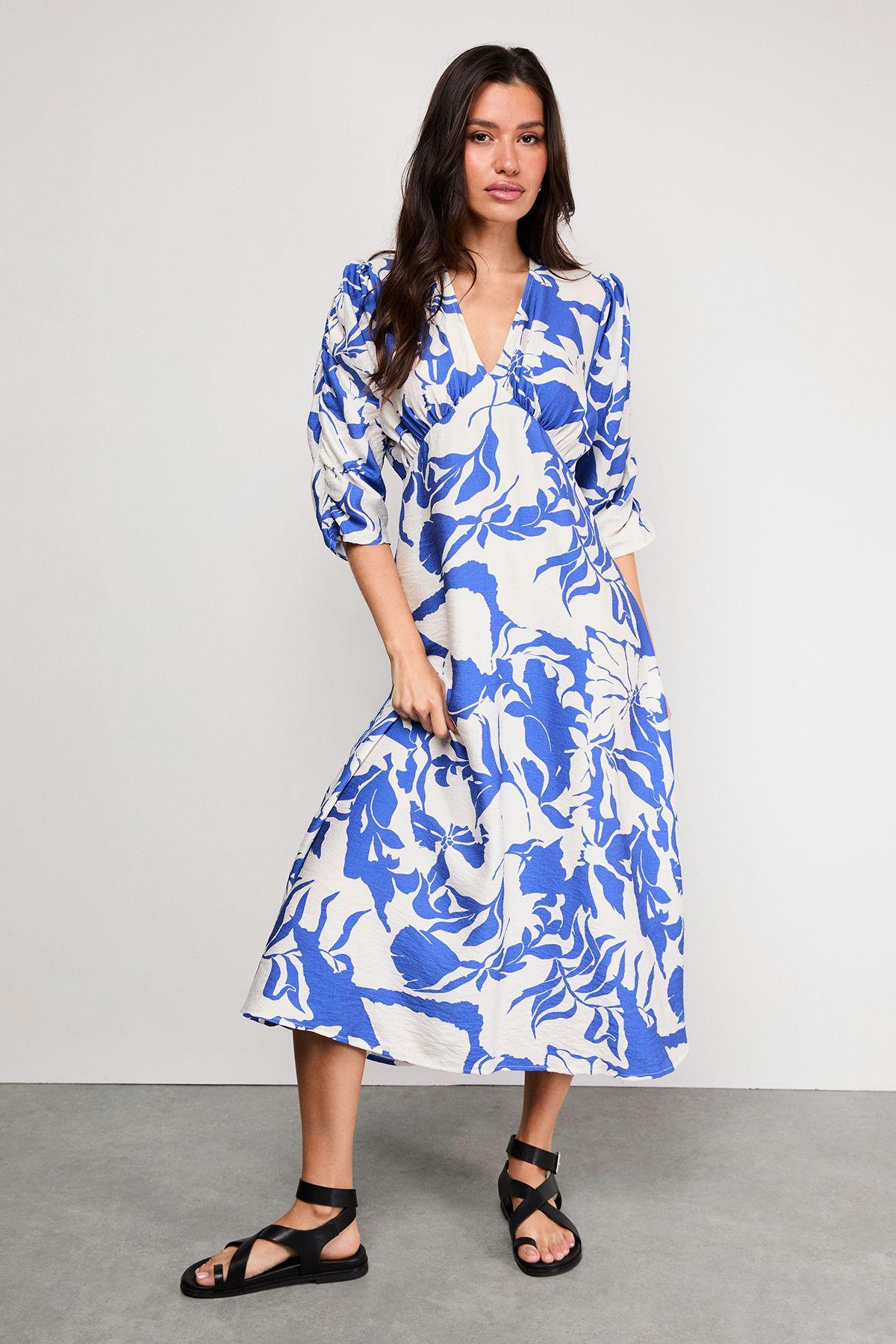 Petite Viscose Floral V Neck Puff Sleeve Midi Dress by WAREHOUSE Petite Viscose Floral V Neck Puff Sleeve Midi Dress by WAREHOUSE