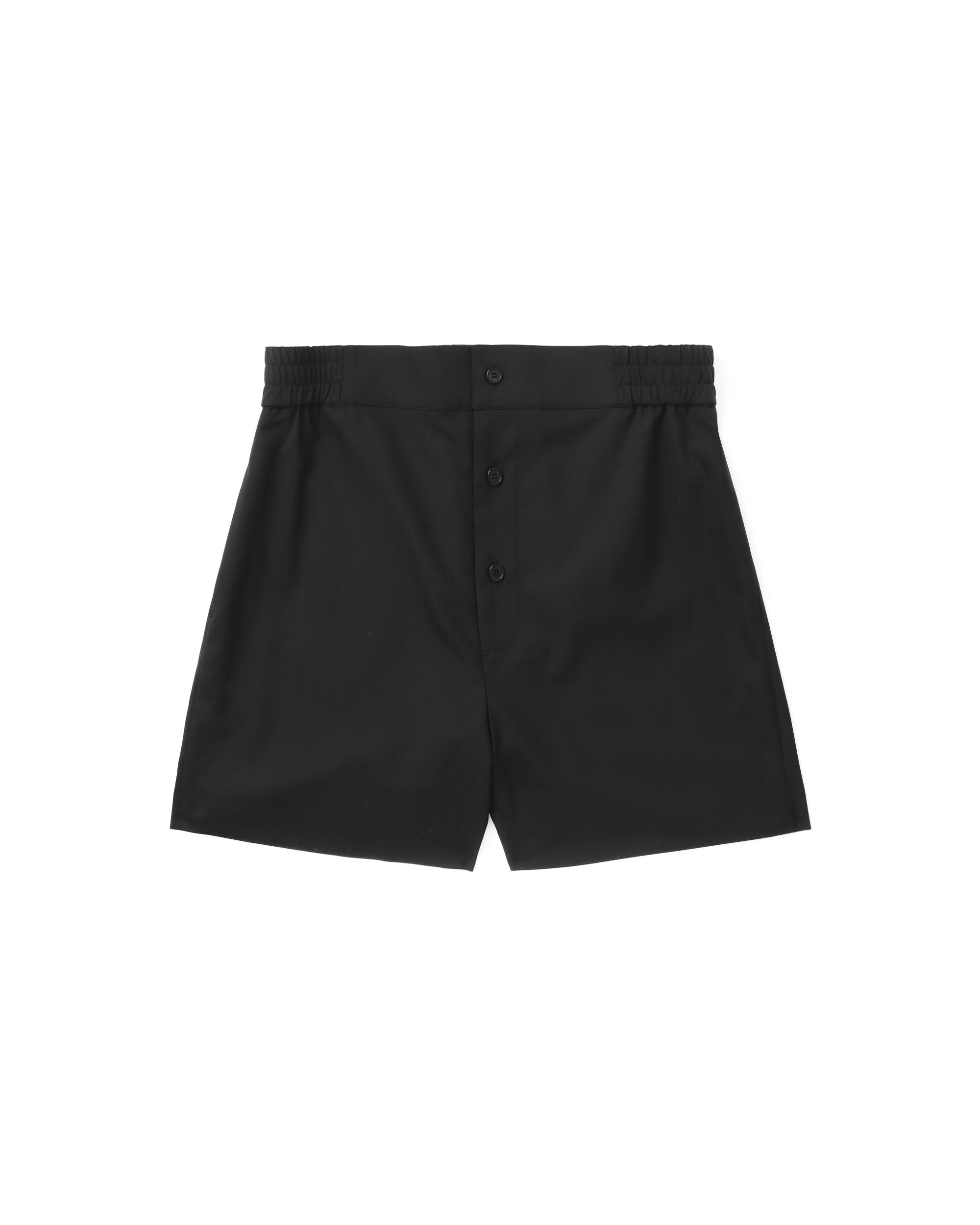 Button down shorts by WE11DONE