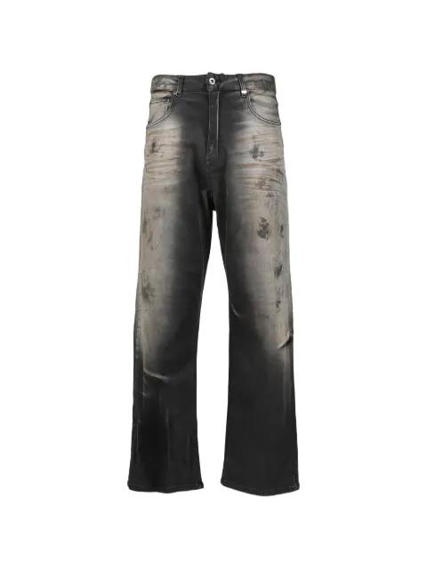 dirty-washed jeans by WE11DONE