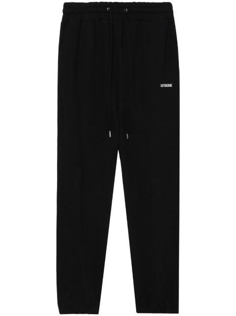 logo-print cotton track trousers by WE11DONE