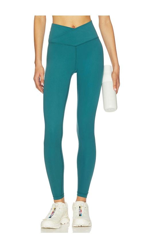 WellBeing + BeingWell FlowWell Callista Crossover Legging in Teal by WELLBEING + BEINGWELL