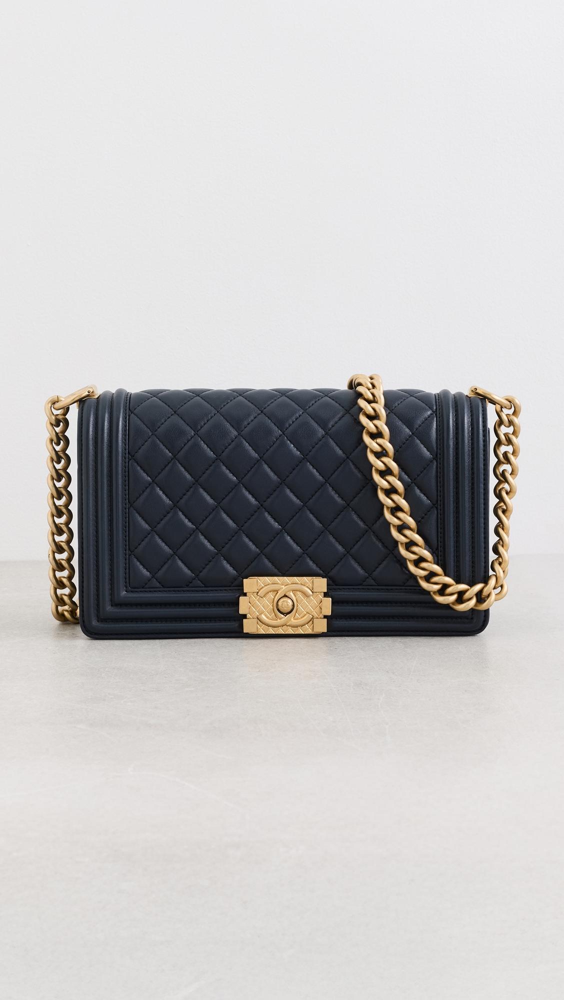 Chanel Navy Lambskin Logo Top Handle Boy Medium Bag by WHAT GOES AROUND COMES AROUND