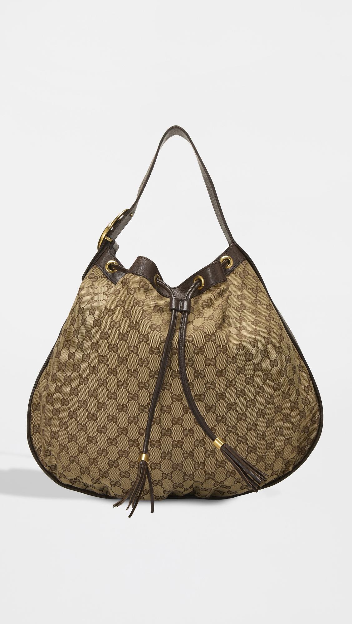 Gucci Brown Canvas Interlocking Drawstring Hobo Bag by WHAT GOES AROUND COMES AROUND