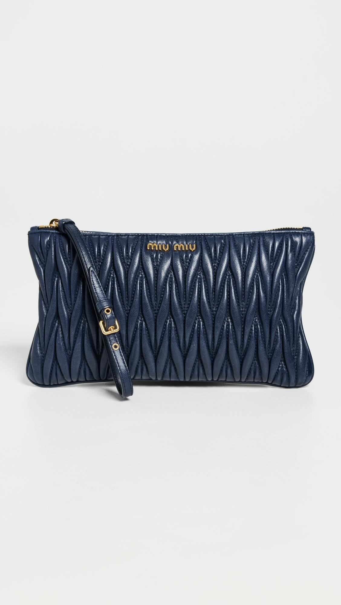 Miu Miu Navy Leather Matelasse Bag by WHAT GOES AROUND COMES AROUND