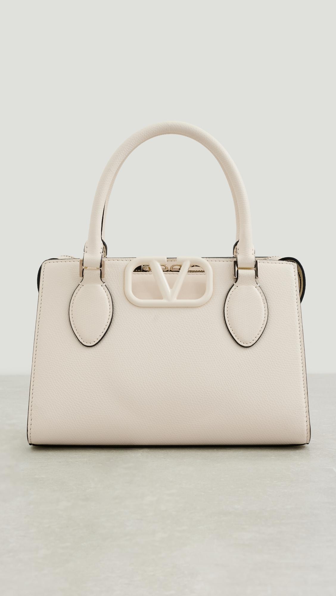 Valentino Leather V Sling Handbag by WHAT GOES AROUND COMES AROUND