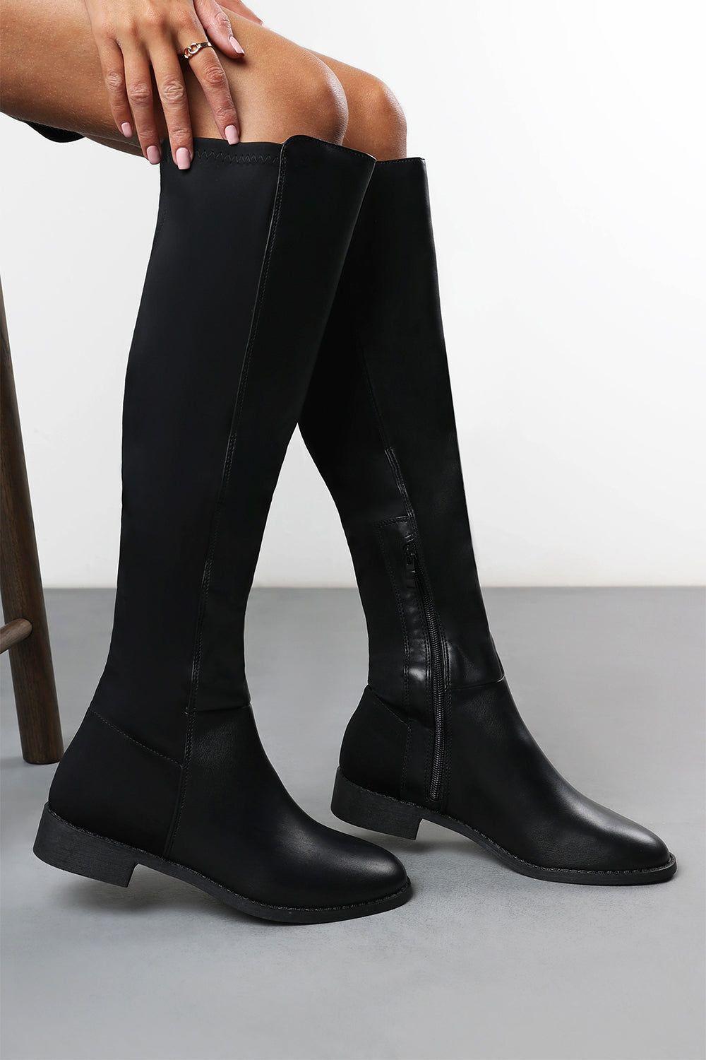 'Verity' Faux Leather Stretch Over Knee Flat Riding Boots by WHERE'S THAT FROM