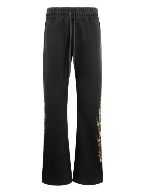 Flame Glass track pants by WHO DECIDES WAR