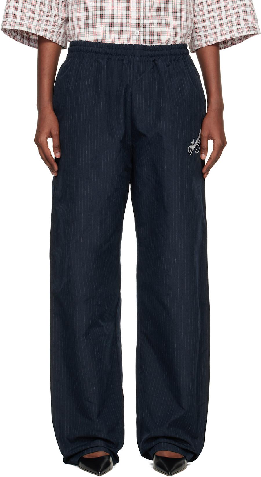 Navy Ruff Rider Track Pants by WILLY CHAVARRIA