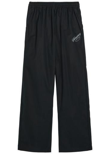 Ruff Rider logo-embroidered cotton trousers by WILLY CHAVARRIA