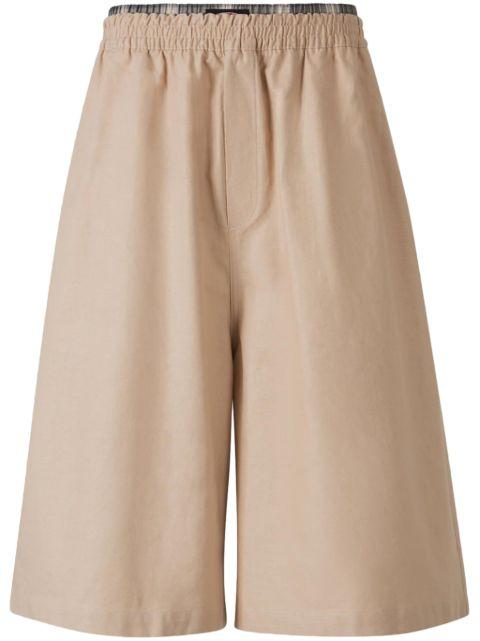 layered-detail shorts by WILLY CHAVARRIA