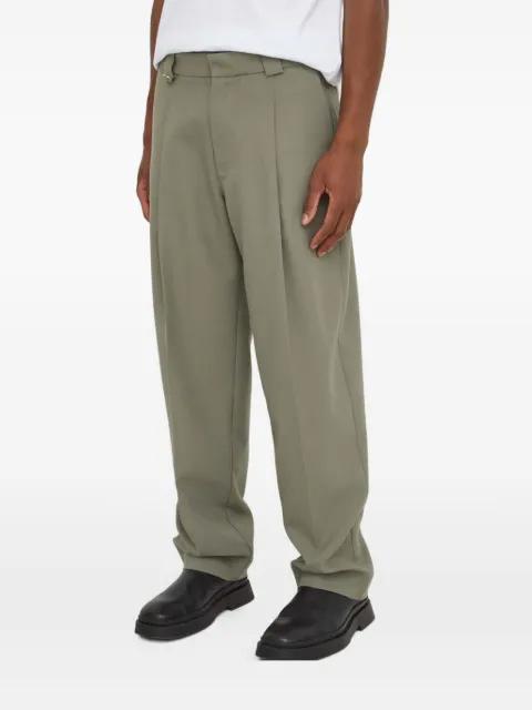 pleated-design trousers by WON HUNDRED