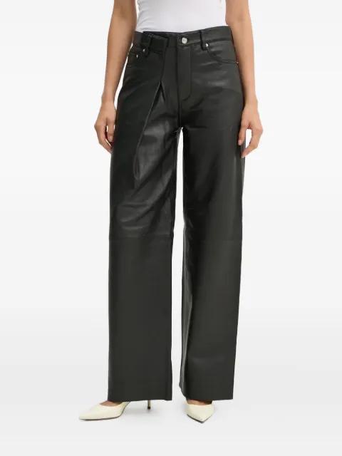 pleated-front leather trousers by WON HUNDRED