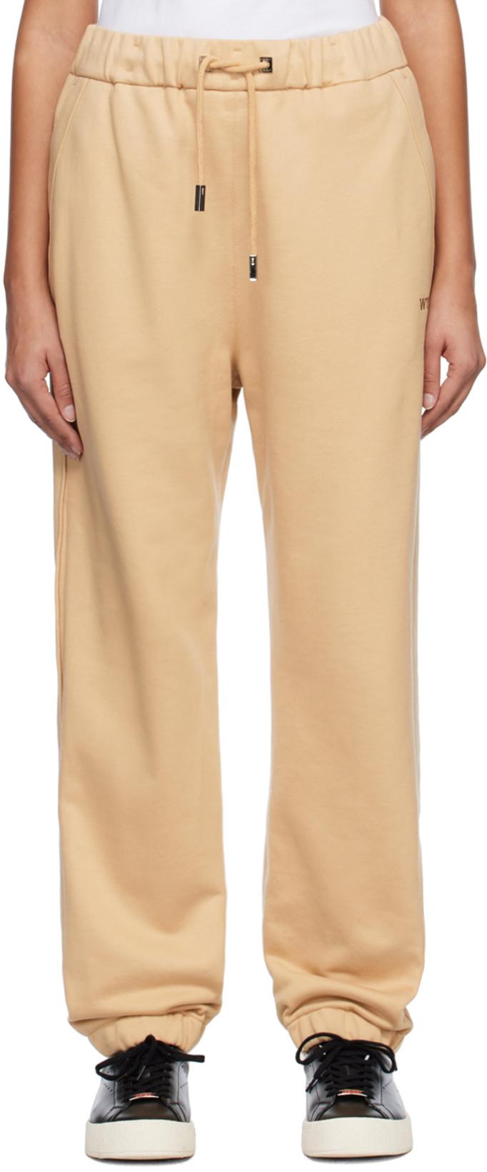 Beige Drawstring Lounge Pants by WOOYOUNGMI