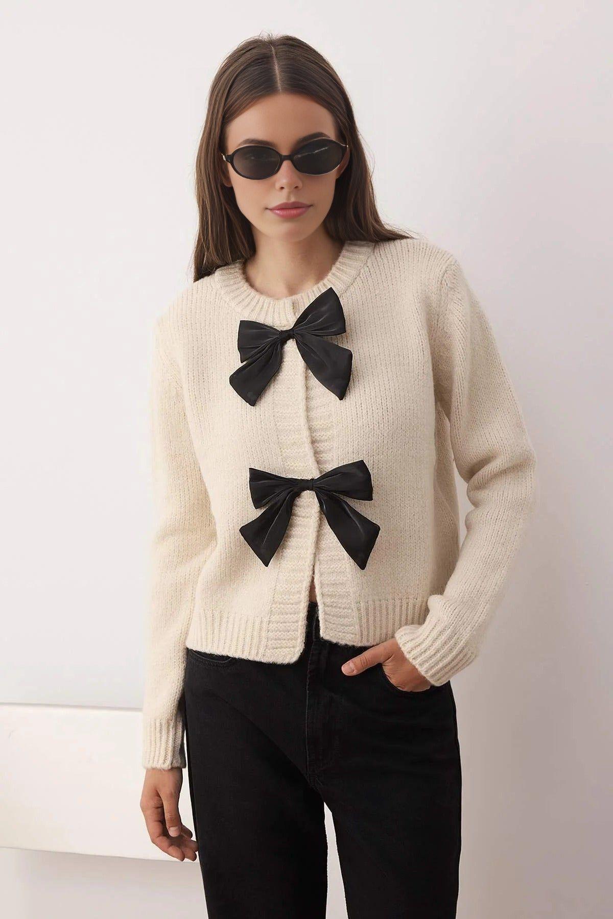 Crew Neck Knit Cardigan with Ribbon Detail by WOVCOR