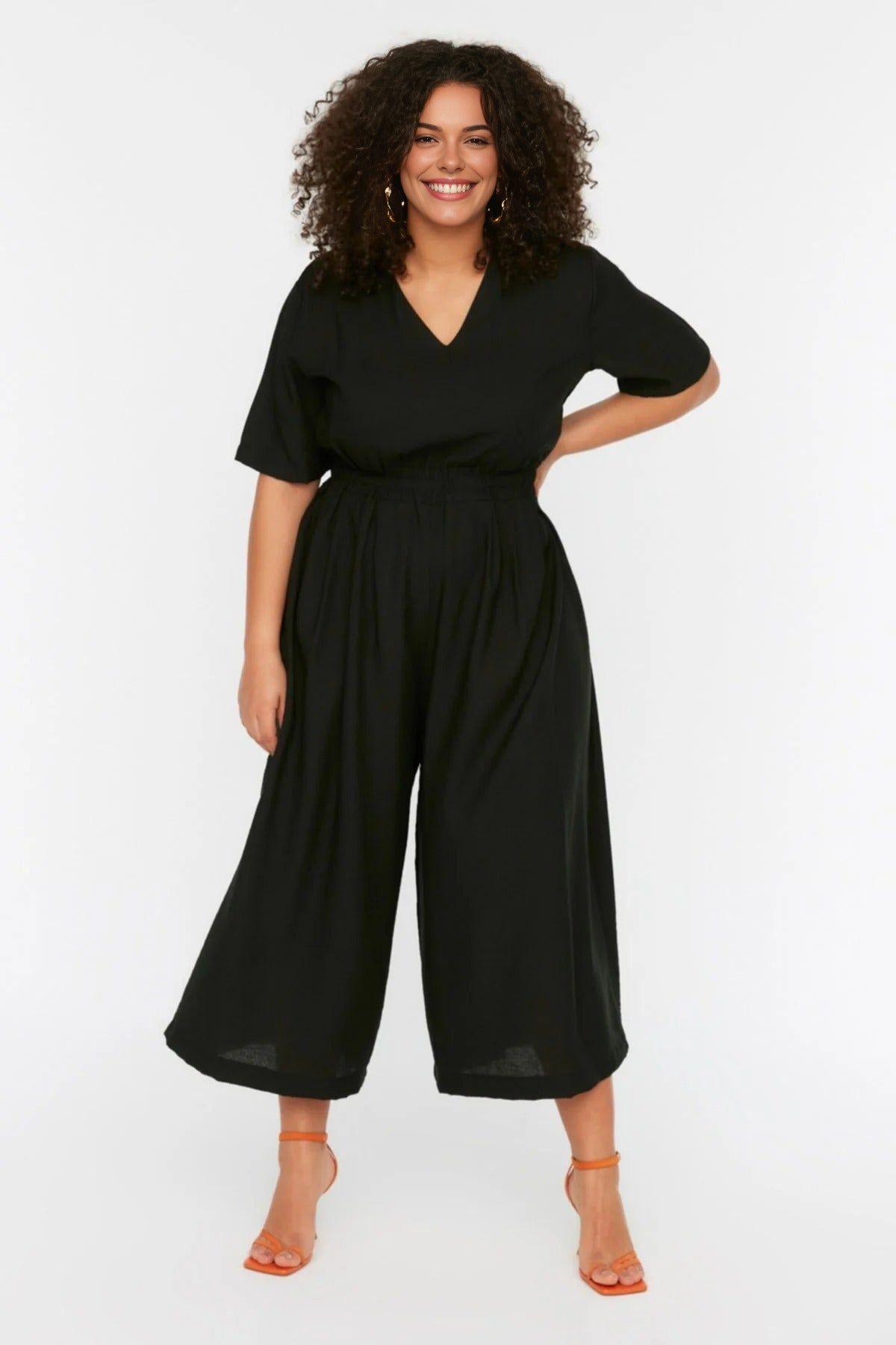 Elastic Waist Wide Leg Jumpsuit with V Neck Detail by WOVCOR