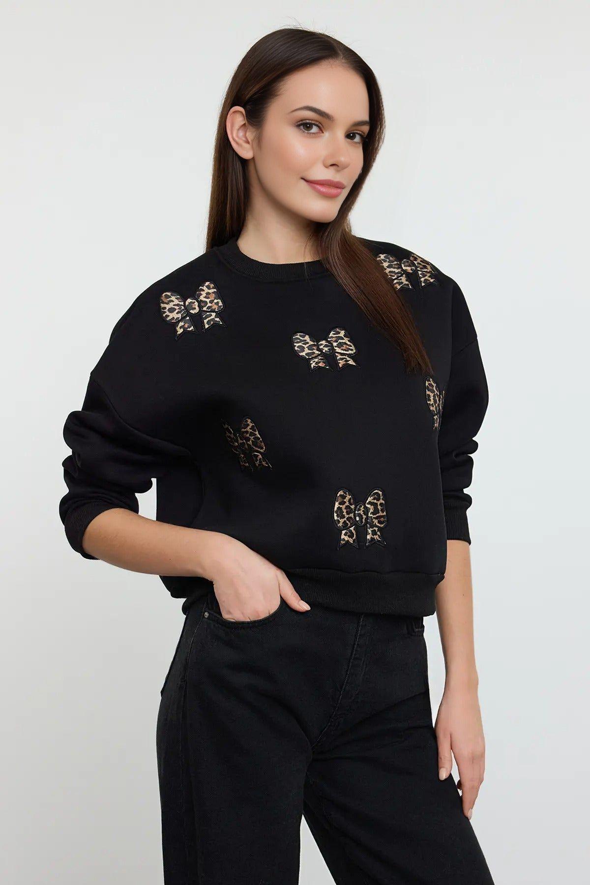 Leopard Bow Embroidered Fleece Sweatshirt by WOVCOR