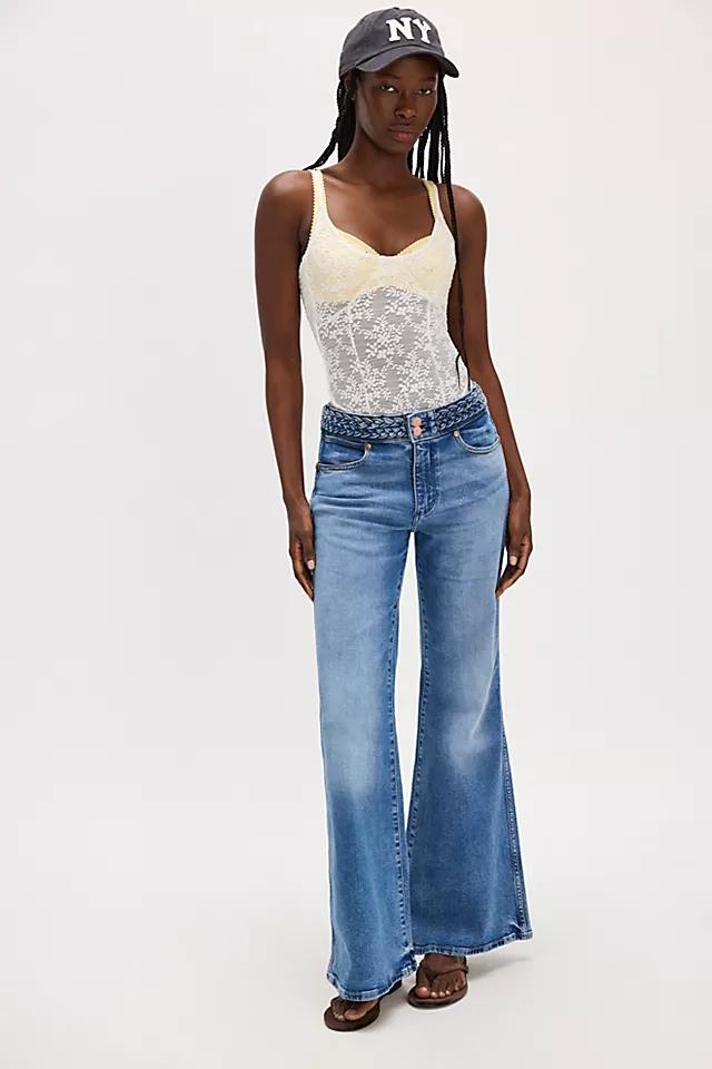 Wrangler Mid-Rise Flare Jeans by WRANGLER | FREE PEOPLE