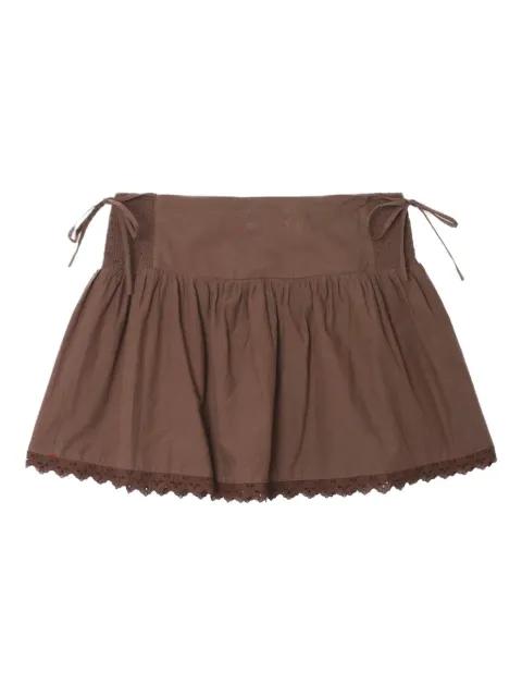 Paloma lace-trimmed smocked skirt by XIRENA