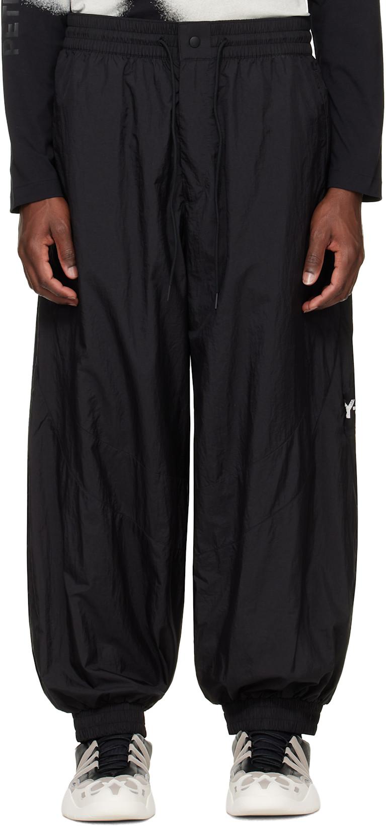 Black Raw Edge 3 Stripes Nylon Shell Track Pants by Y3