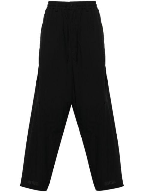 logo-printed panelled track pants by Y3