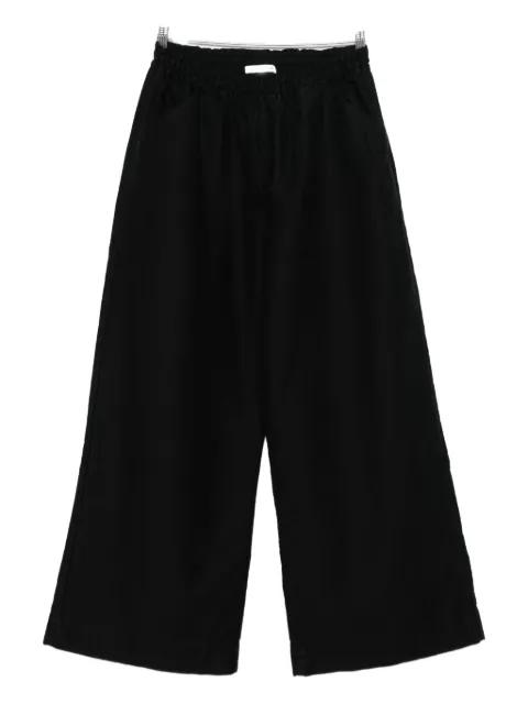 Envelope elasticated trousers by YMC