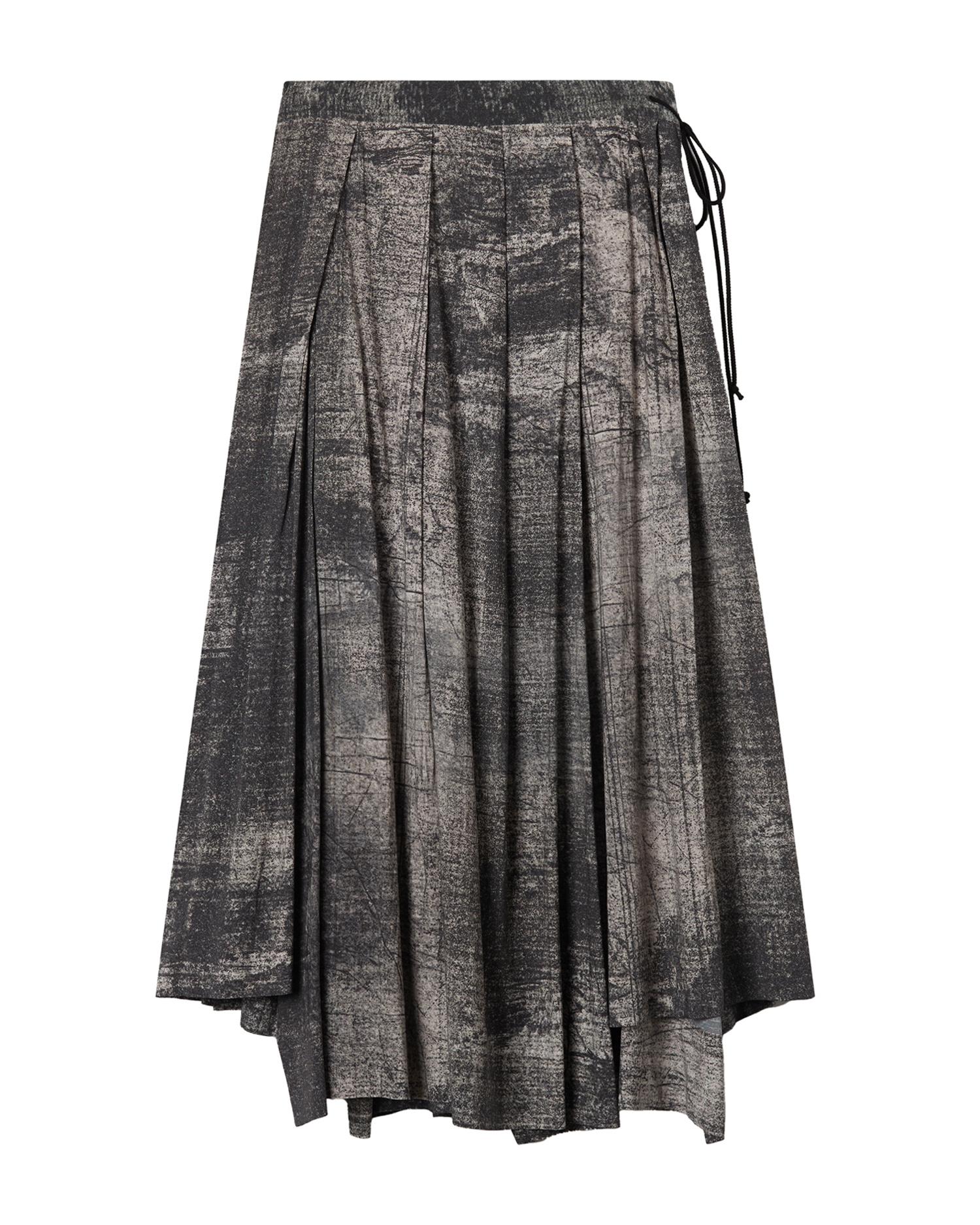 Asymmetric pleated skirt by YOHJI YAMAMOTO