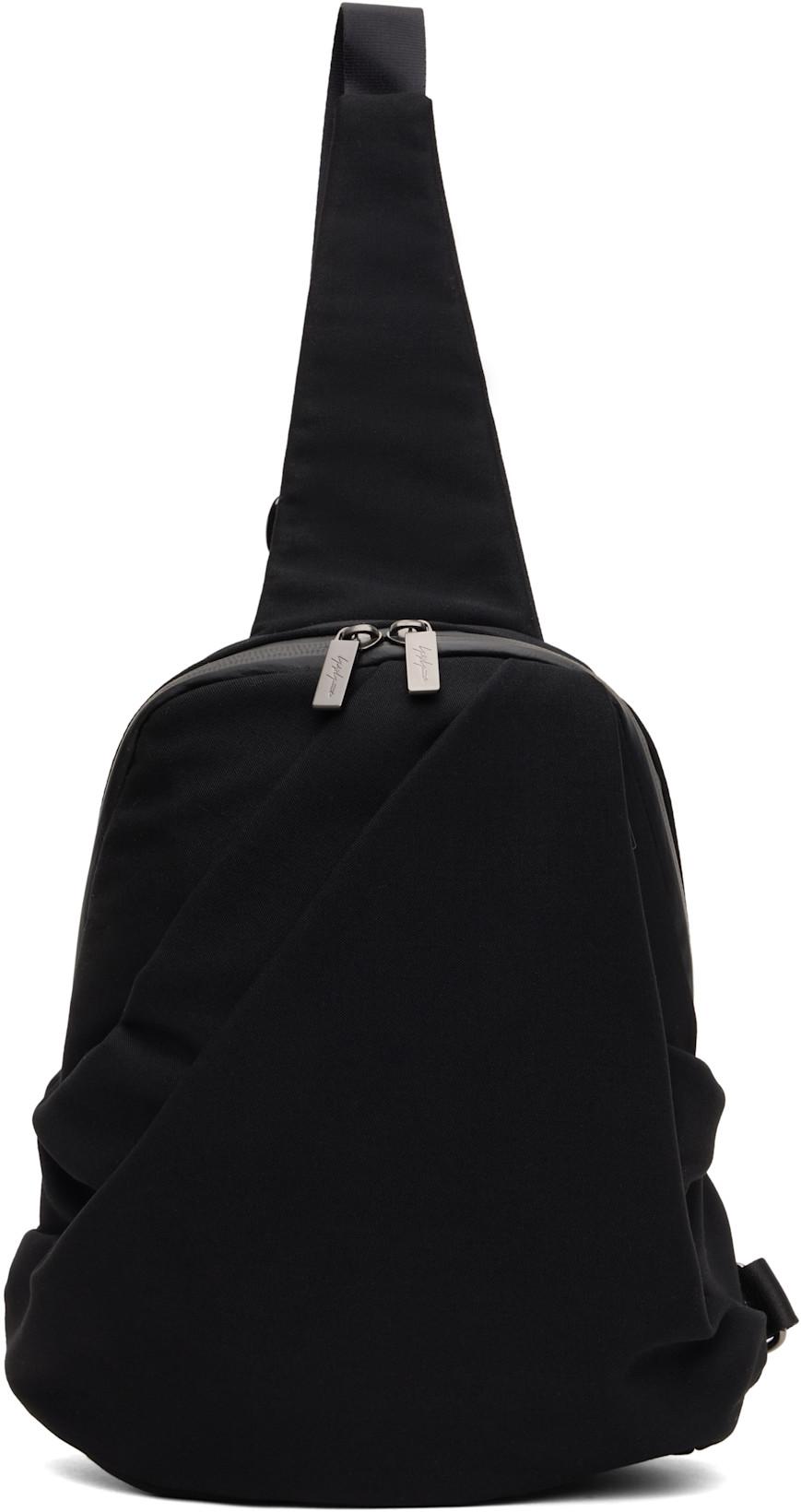 Black Wool Gabardine Nylon Tuck Sling Backpack by YOHJI YAMAMOTO Black Wool Gabardine Nylon Tuck Sling Backpack by YOHJI YAMAMOTO