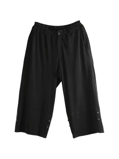button-detail trousers by YOHJI YAMAMOTO