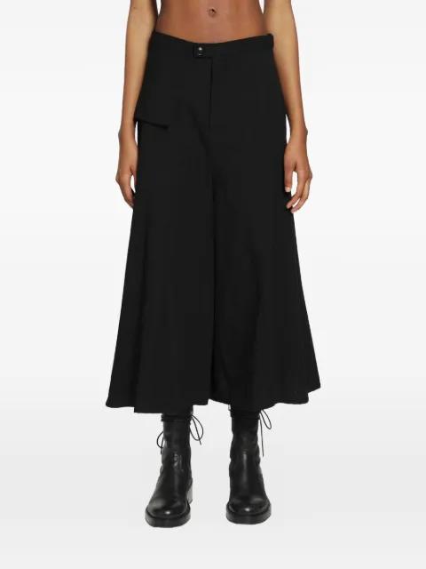 flap-detail flared trousers by YOHJI YAMAMOTO