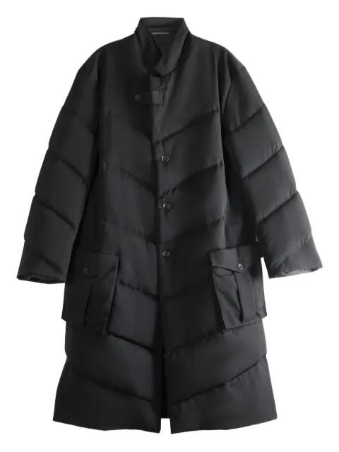quilted diagonal-seam coat by YOHJI YAMAMOTO