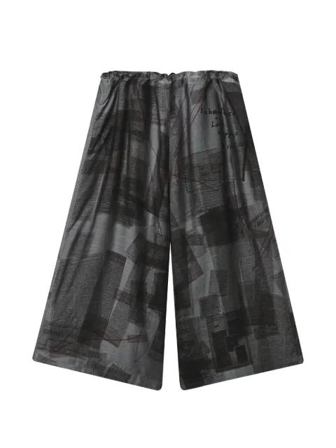 newspaper-print wide-leg trousers by Y'S