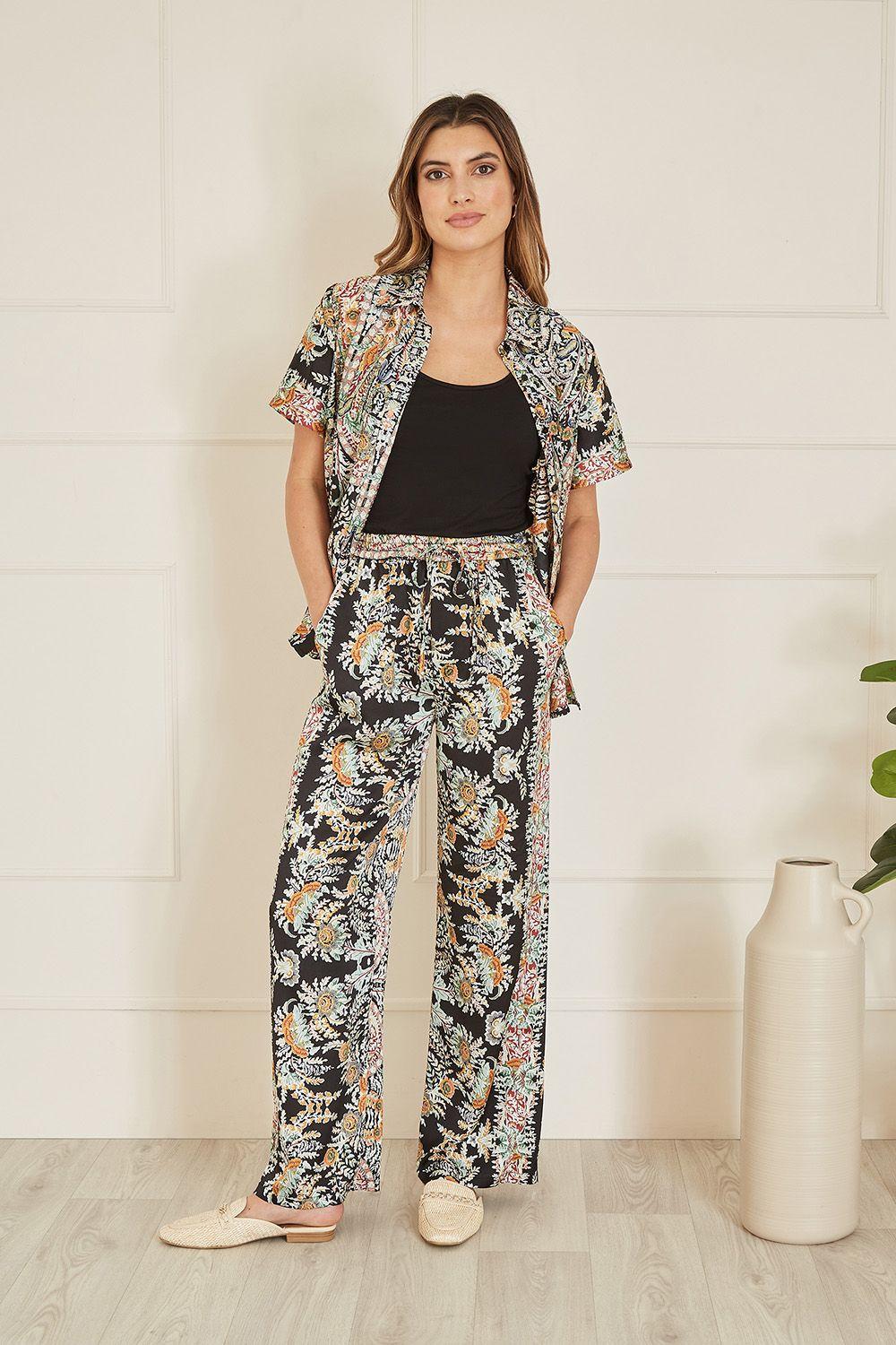 Black Paisley Print Relaxed Fit Trousers by YUMI