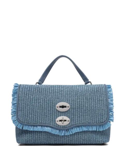 fringed woven clutch bag by ZANELLATO