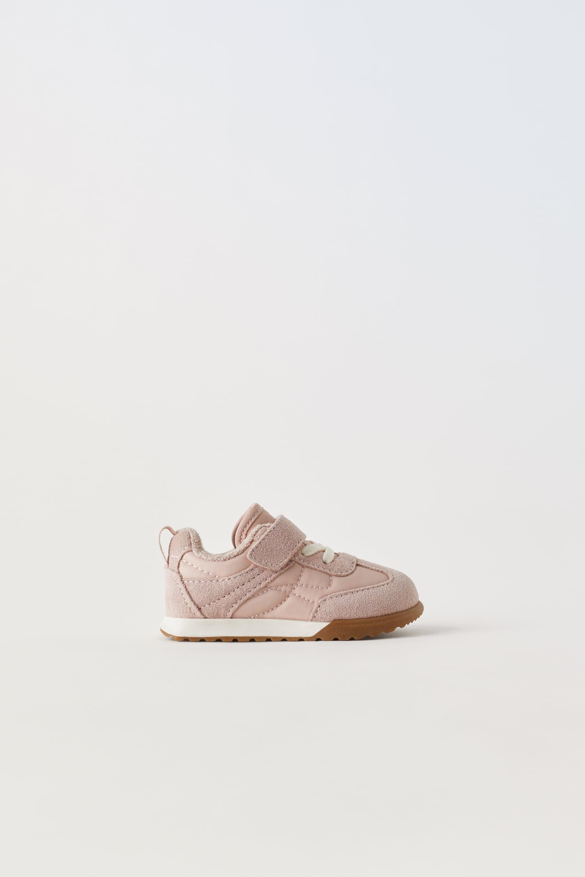 CONTRASTING LEATHER SNEAKERS by ZARA