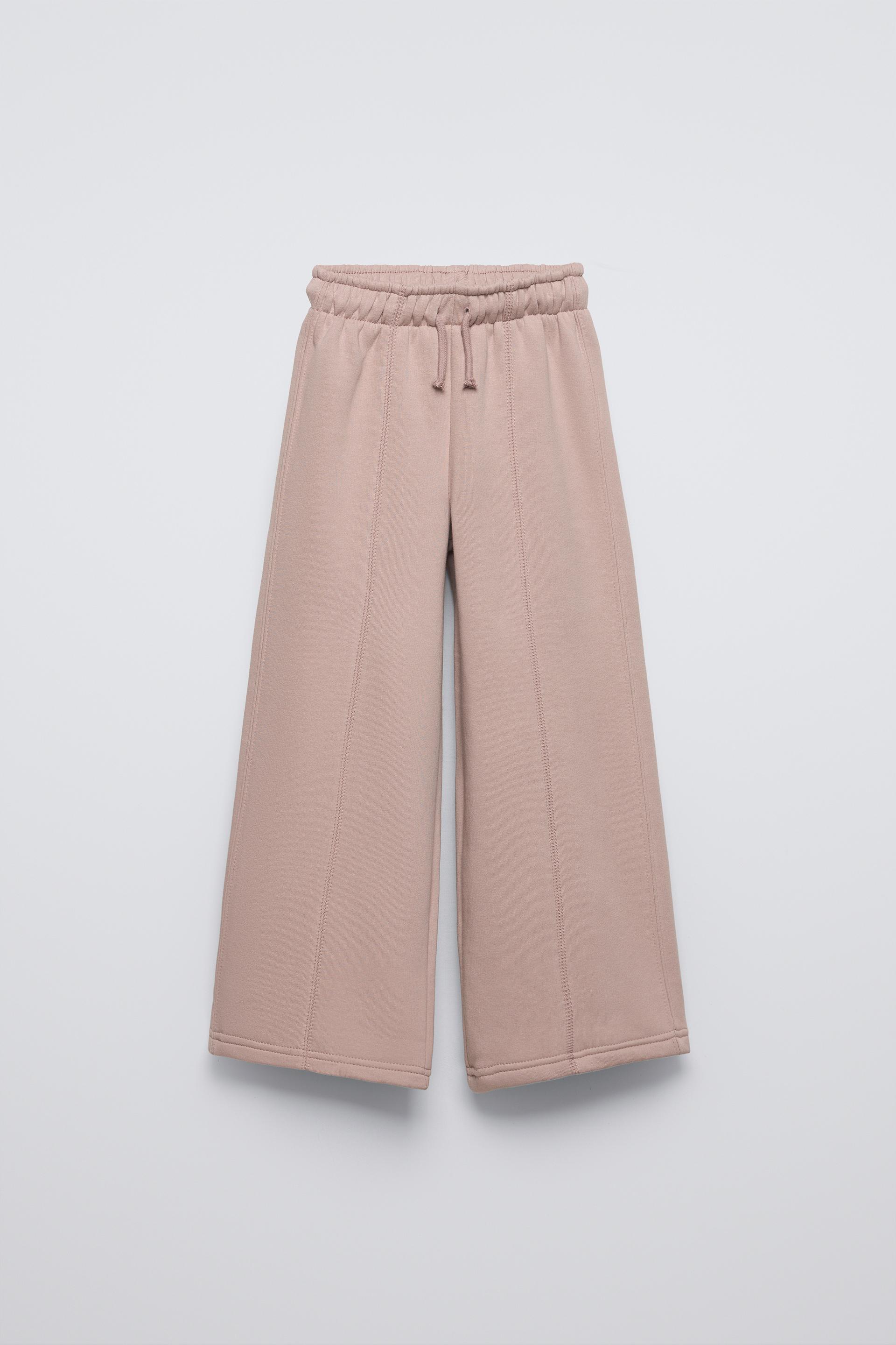 Elastic waistband pants. Adjustable front drawstring. Front raised seam detail. Warm and soft interior. by ZARA