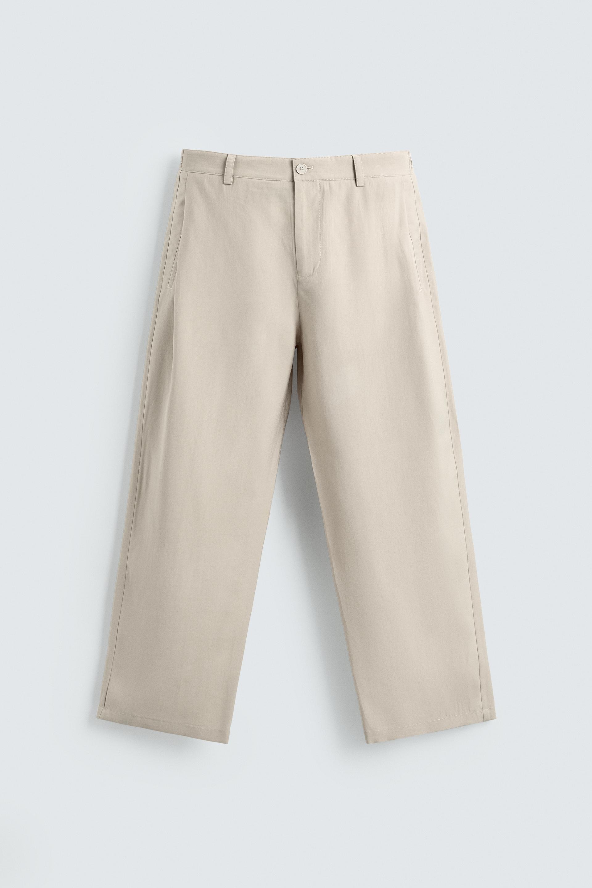 FLOWY PANTS WITH SIDE PLEATS by ZARA