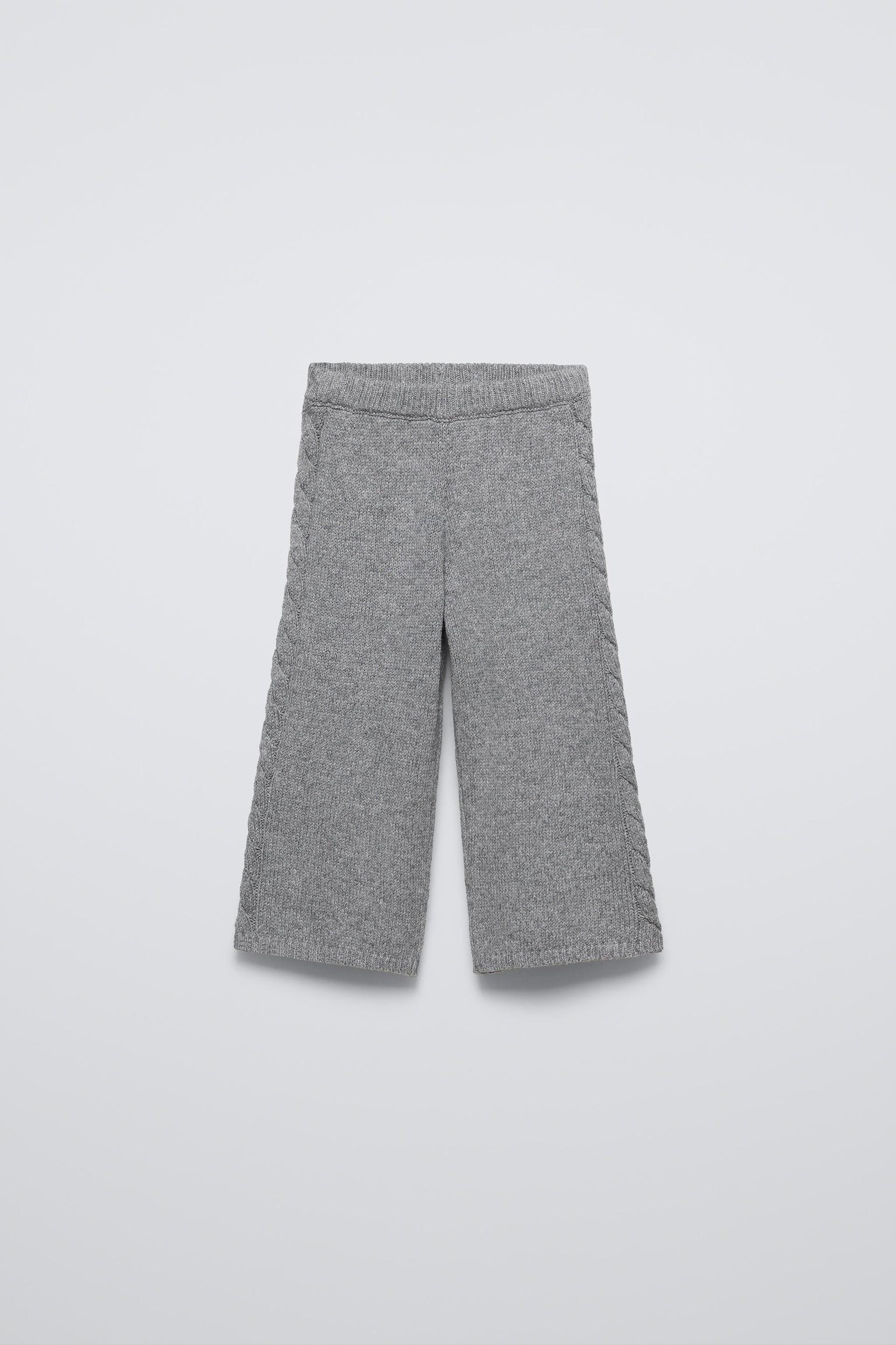 Knit pants with elastic waistband. Cable knit sides. by ZARA