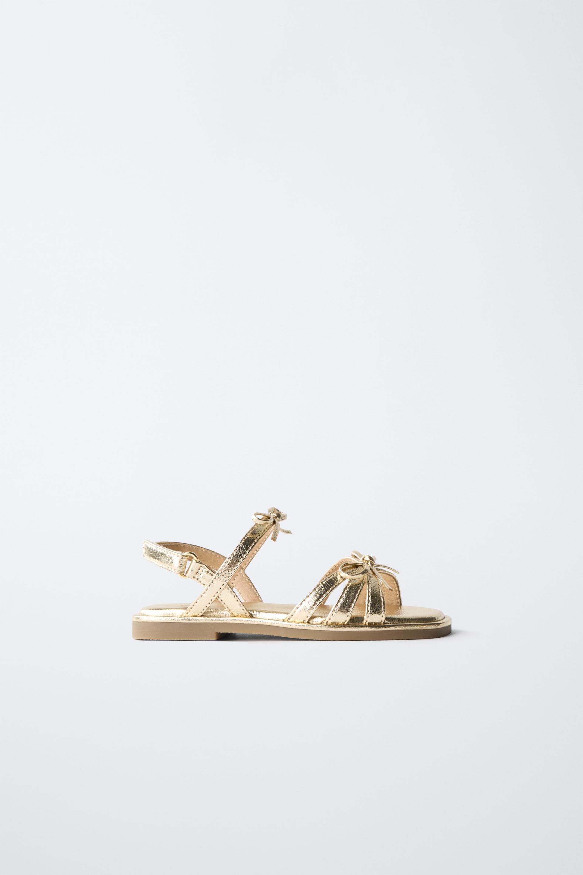 METALLIC BOW SANDALS by ZARA