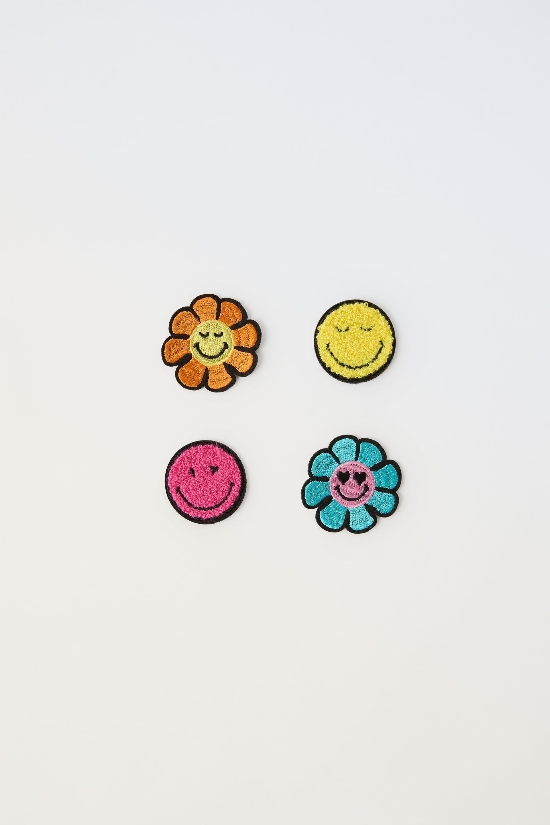 PACK OF FOUR SMILEYWORLD ® IRON-ON PATCHES by ZARA