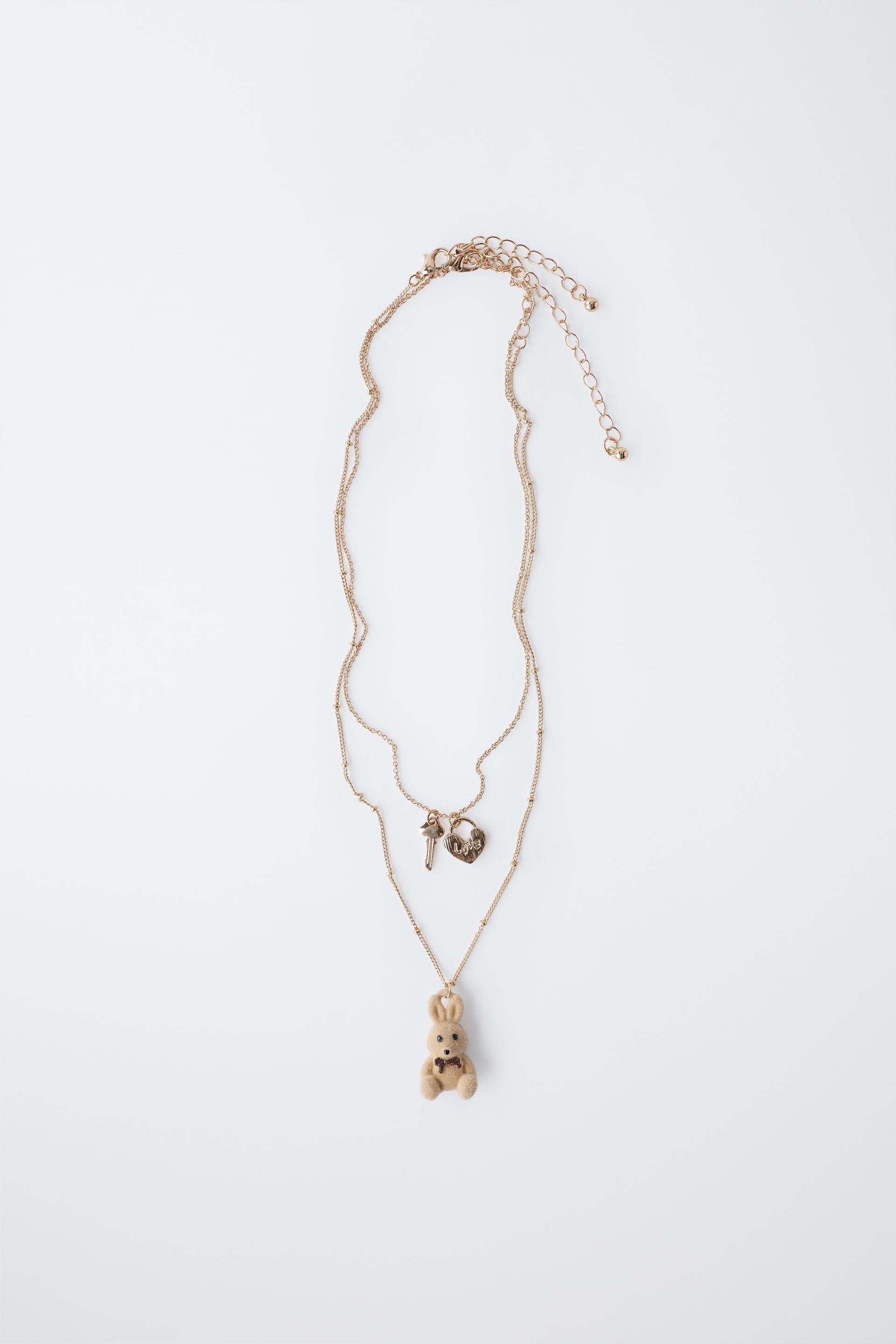 PACK OF TWO FLOCKED RABBIT AND PADLOCK NECKLACES by ZARA PACK OF TWO FLOCKED RABBIT AND PADLOCK NECKLACES by ZARA