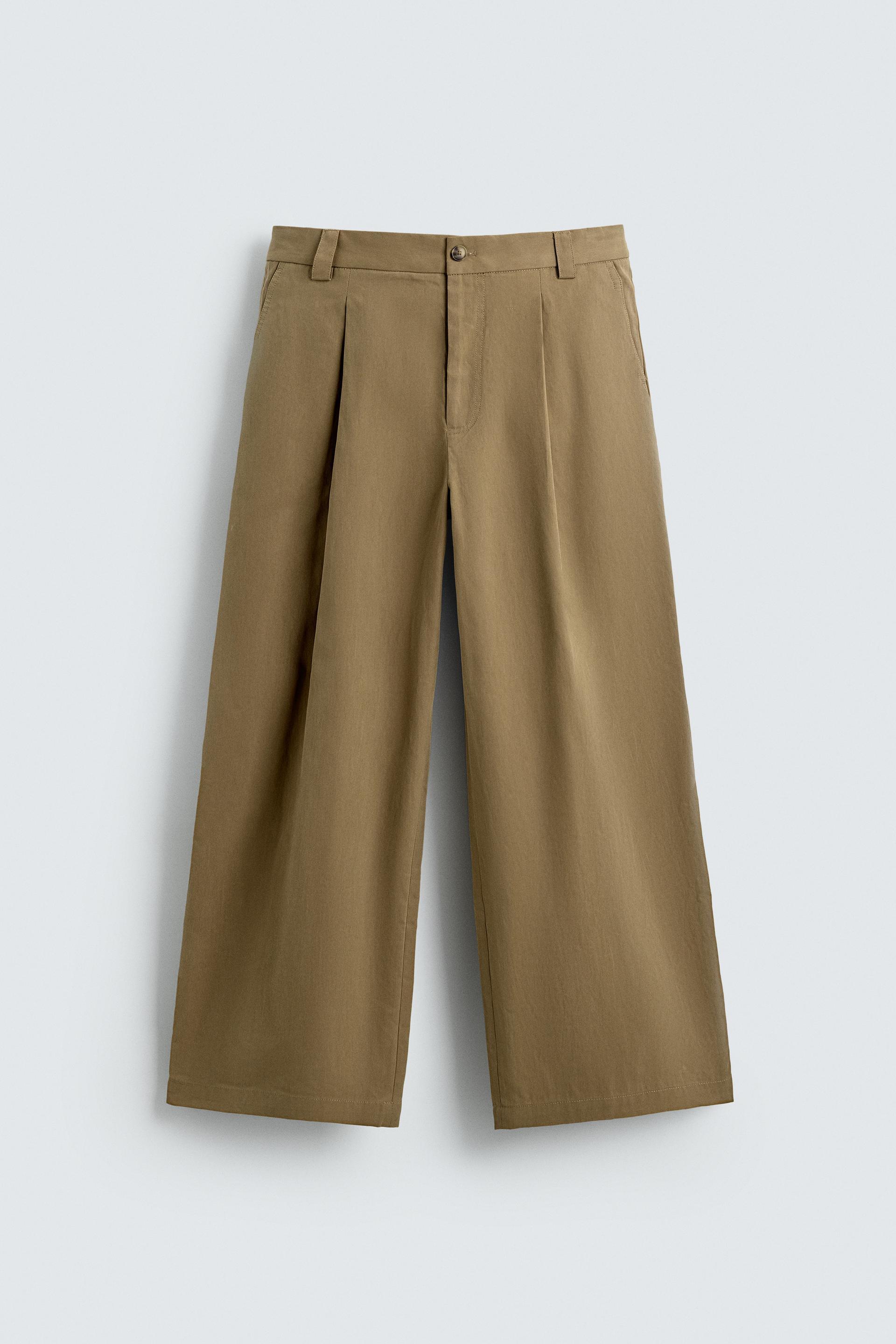 PLEATED BARREL FIT PANTS by ZARA