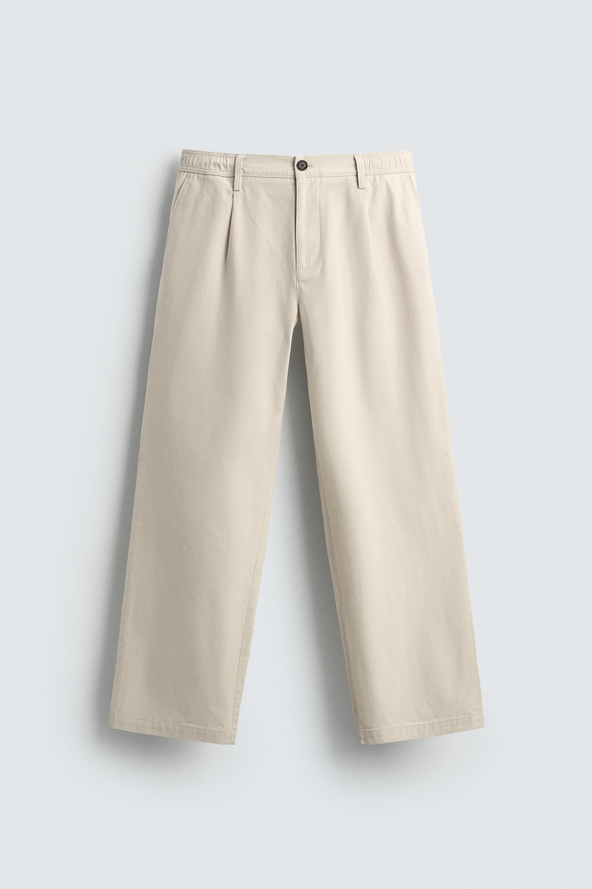 PLEATED STRAIGHT FIT PANTS by ZARA