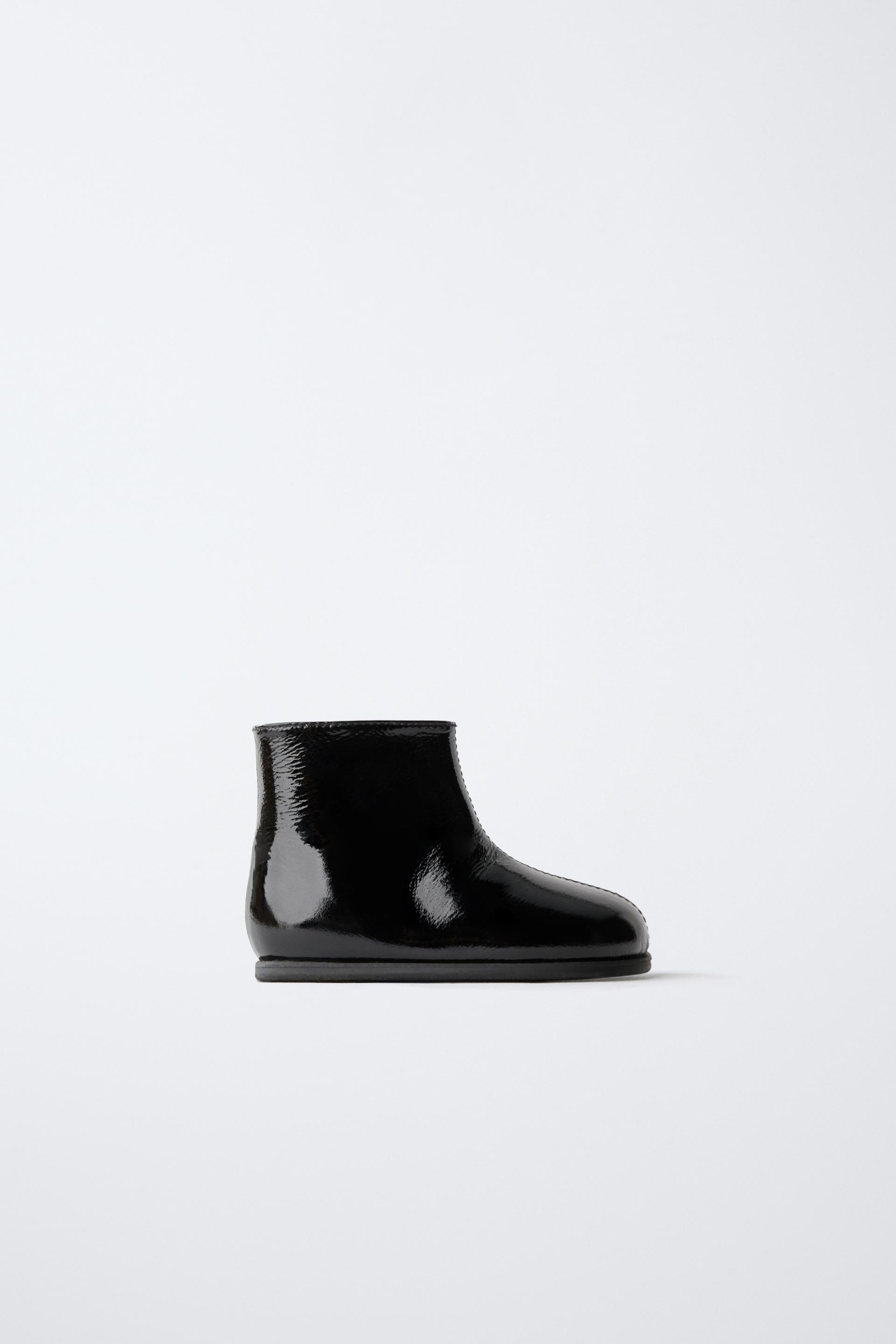 QUILTED LEATHER BOOTS by ZARA