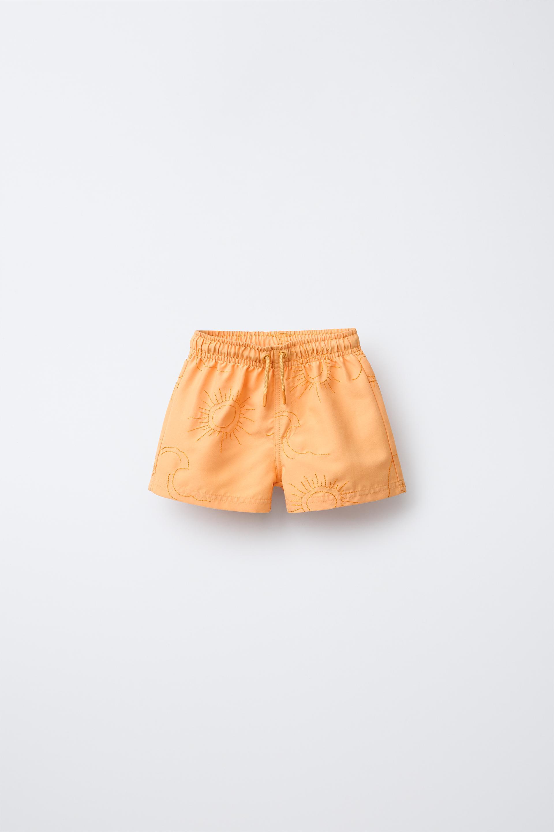 REGULAR SWIM SHORTS WITH EMBROIDERED SUNS by ZARA