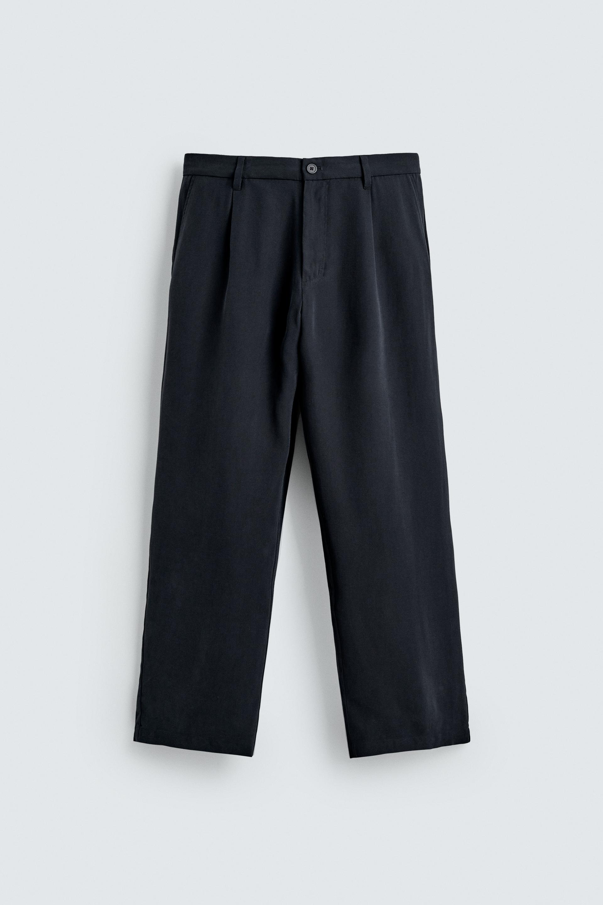 RELAXED FIT FLOWY PANTS by ZARA