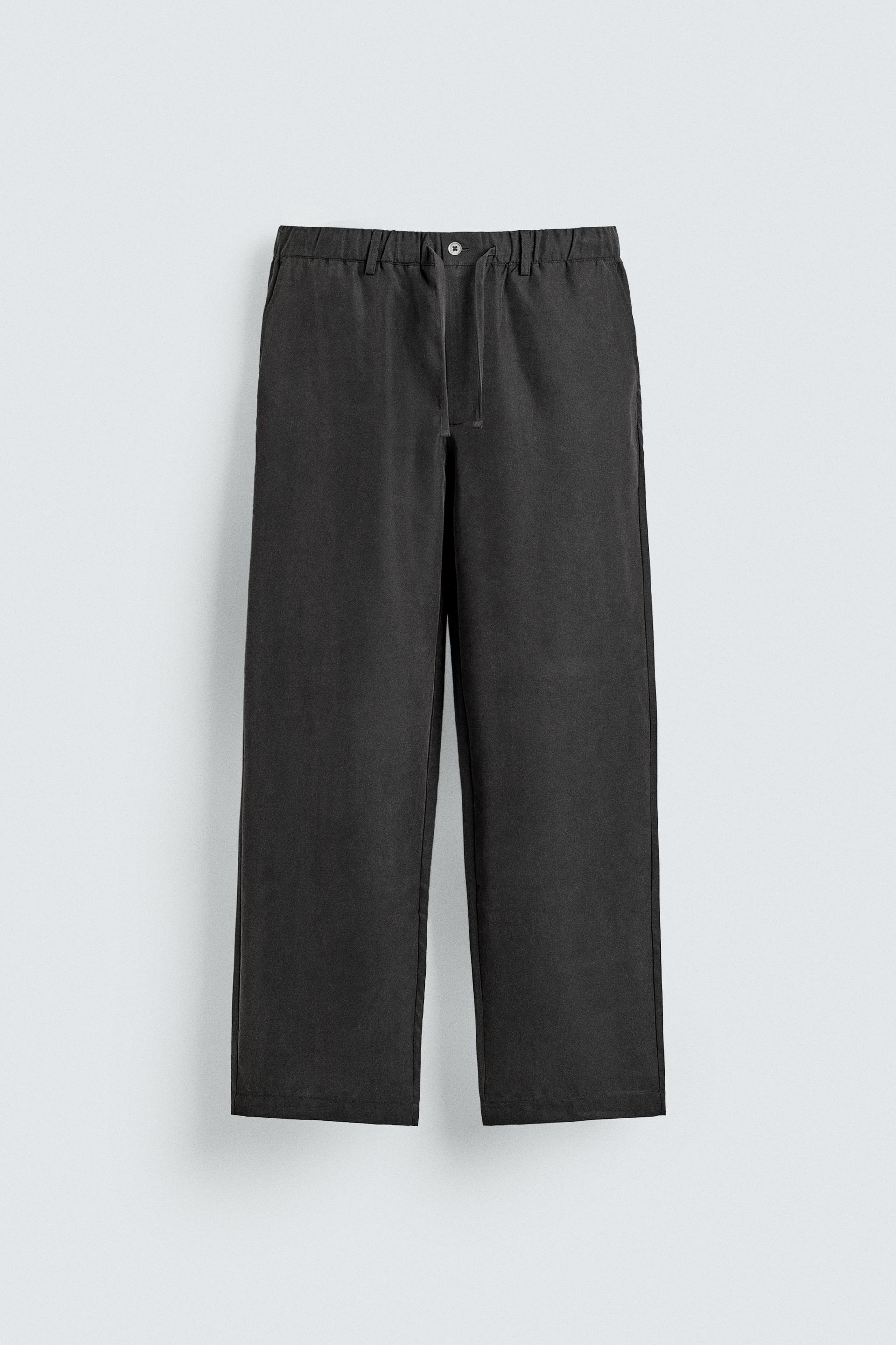 RELAXED FIT FLOWY PANTS by ZARA
