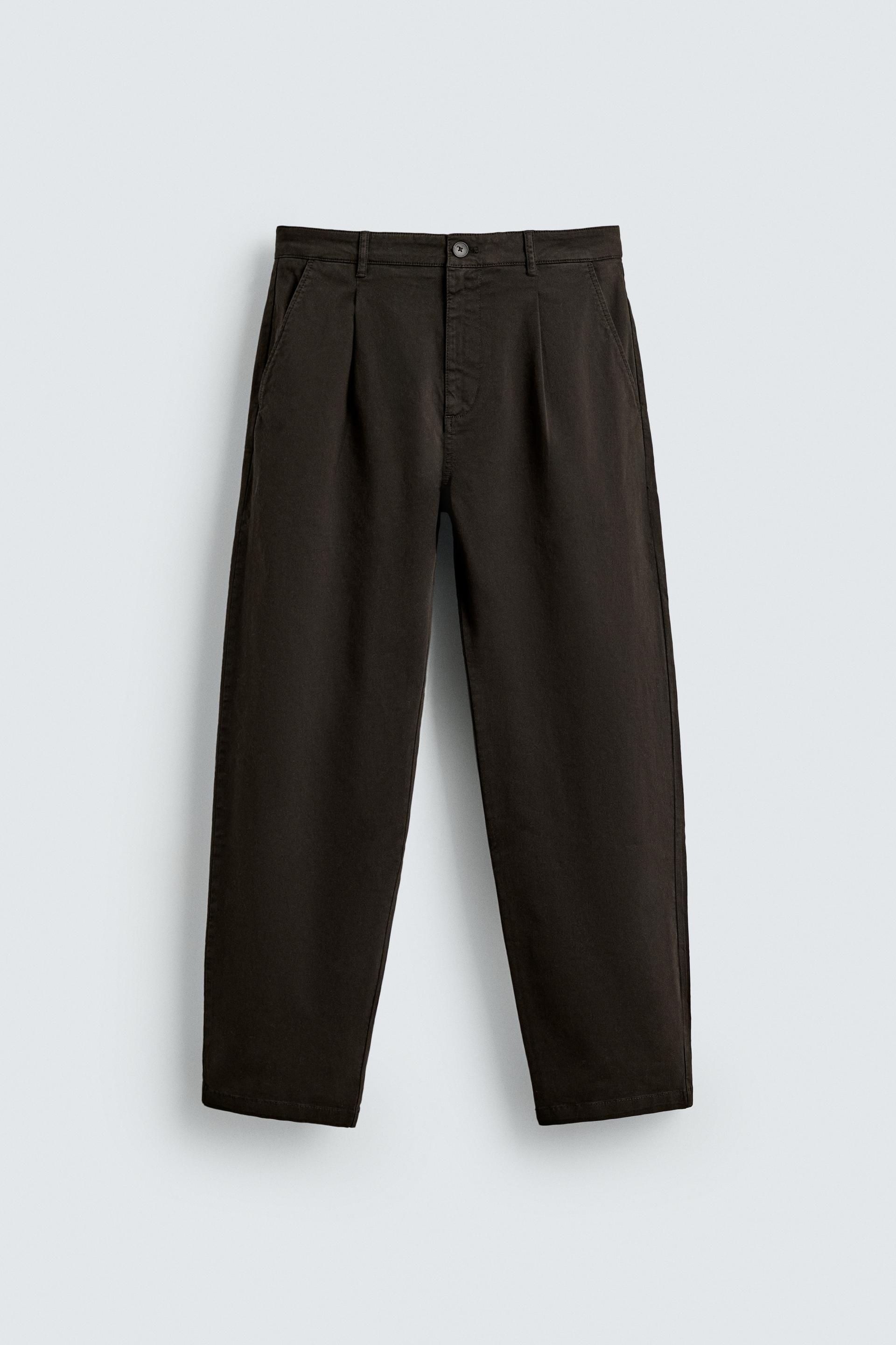 RELAXED FIT PLEATED PANTS by ZARA