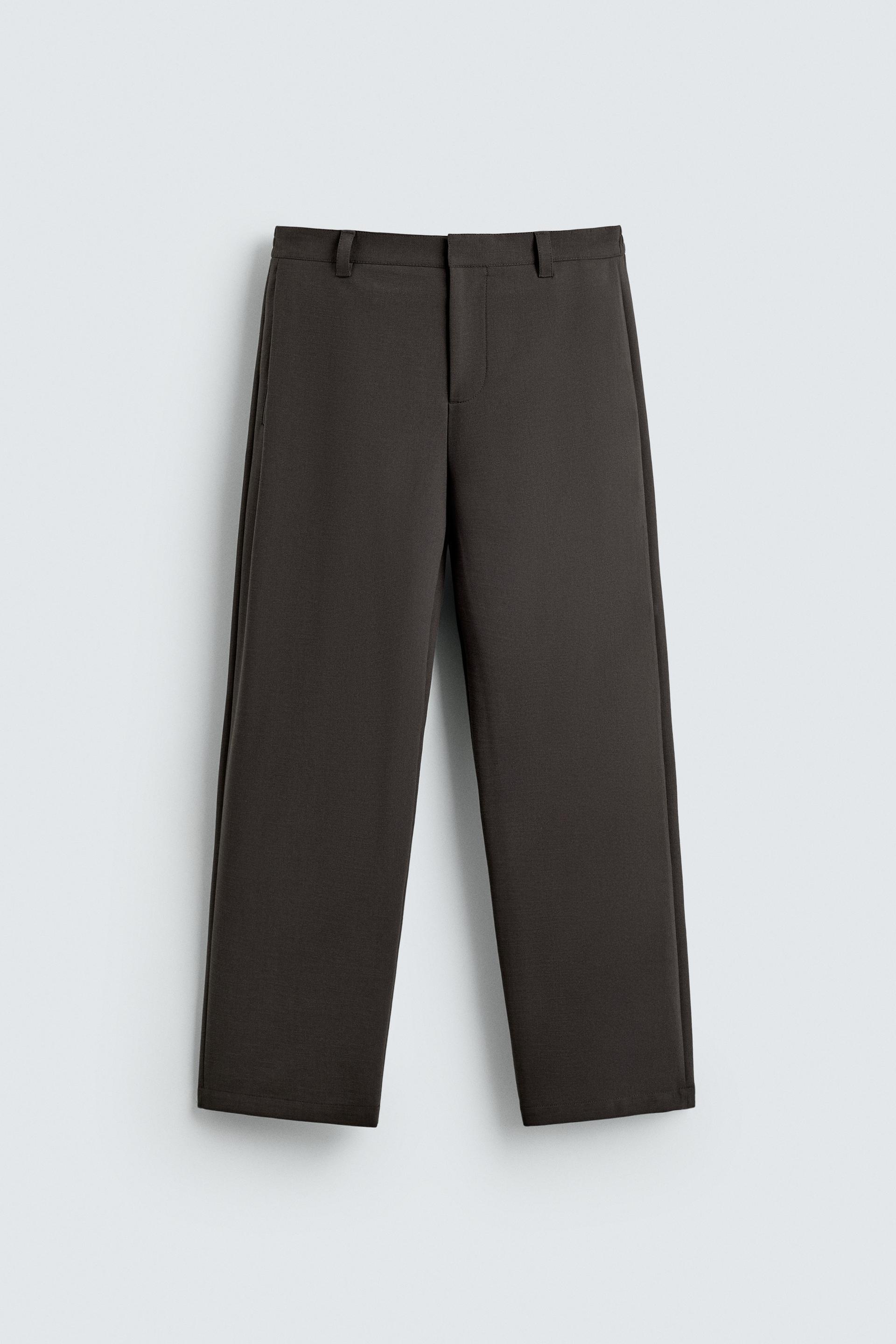 RELAXED FIT PLEATED PANTS by ZARA